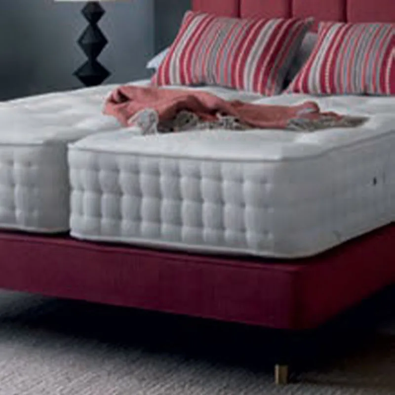 Hypnos offers either sprung or platform top divans in both deep and shallow configurations. Platform top divans provide a highly supportive base for a firmer feel, whilst a sprung base works in harmony with the mattress to provide a more medium feel. Divan bed bases are typically made up of two supportive bases, held securely together with a bracket.

Deep divan bed bases can provide valuable storage to suit the needs of the bedroom. The Hypnos Hideaway and Super Storage are all platform top bases and offer unique ways of making the most of all the storage space under your mattress.

A shallow base divan can also be ordered as either a sprung or platform top base, and it achieves a lighter, simple style complemented by elegant leg choices.
