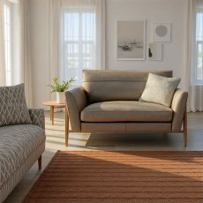 Ercol Forli Snuggler in Leather Ercol Forli Snuggler in Leather